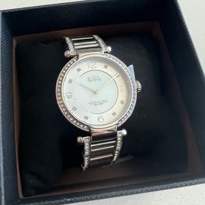 Coach Cary watch. Brand new. Never worn. Never sized. No price tag/ was gift.